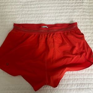 Red Lululemon running shorts. Excellent condition. Smoke free home.